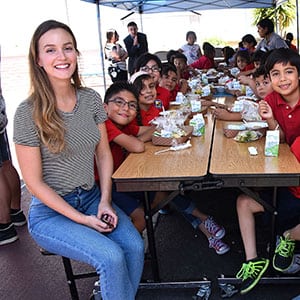 Leighton Meester sitting with children