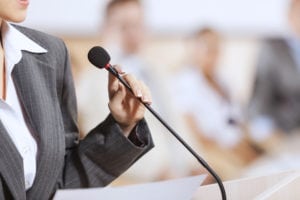 woman, holding mic