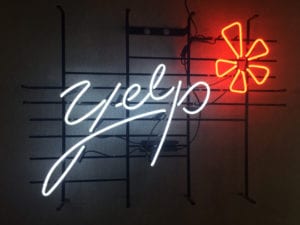 yelp logo in neon
