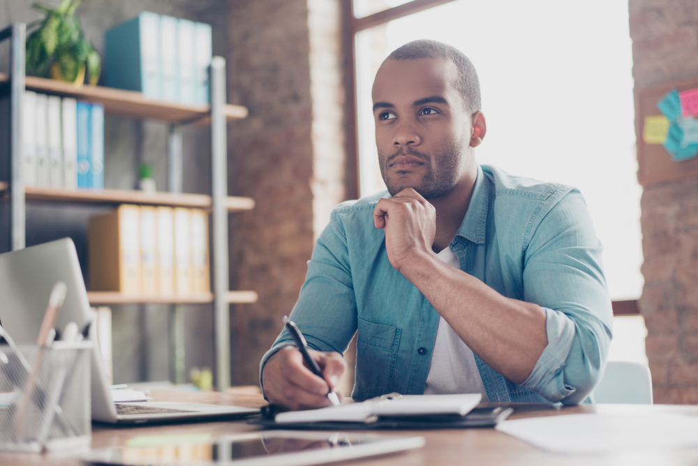 businessman questioning decision at work