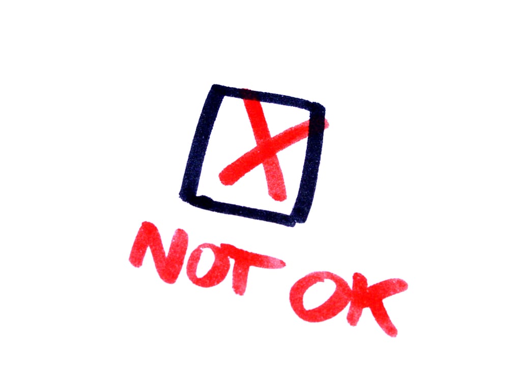 the words "not ok" with a check mark